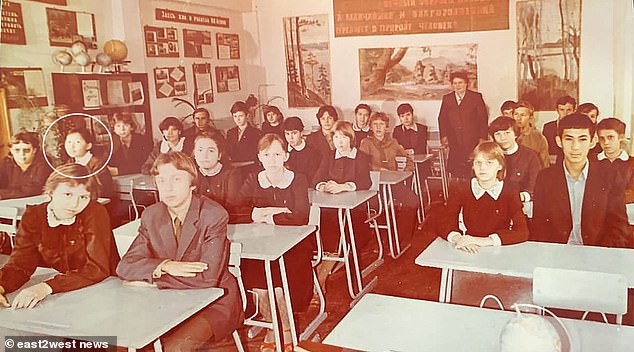 Pictures obtained by DailyMail.com show Omarova growing up in the communist education system. This one shows her around grade nine in about 982-83